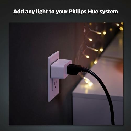 Philips Hue smart plug in wall socket with lights in background