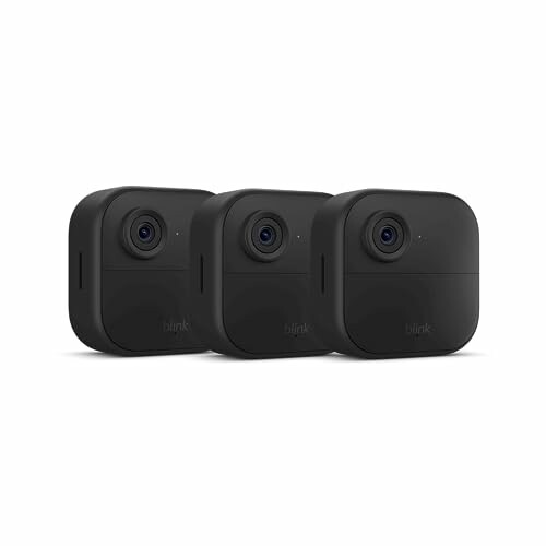 Three Blink outdoor security cameras.